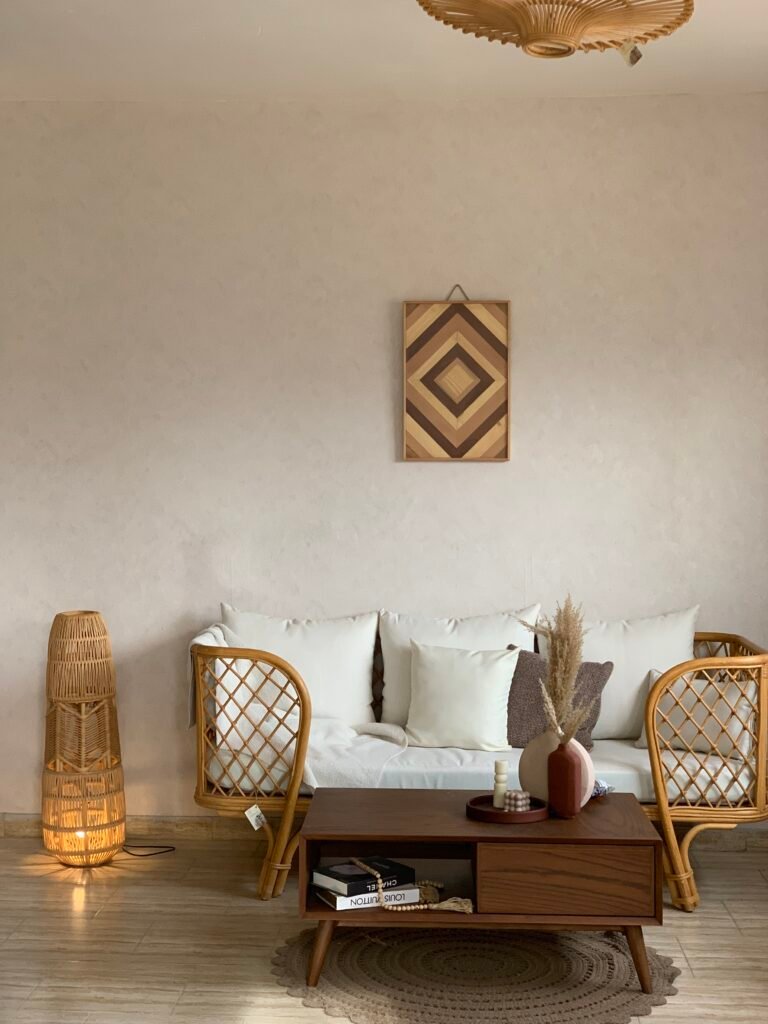 Diamond lattice weave detail on the arm of MASHRABIYA rattan sofa
