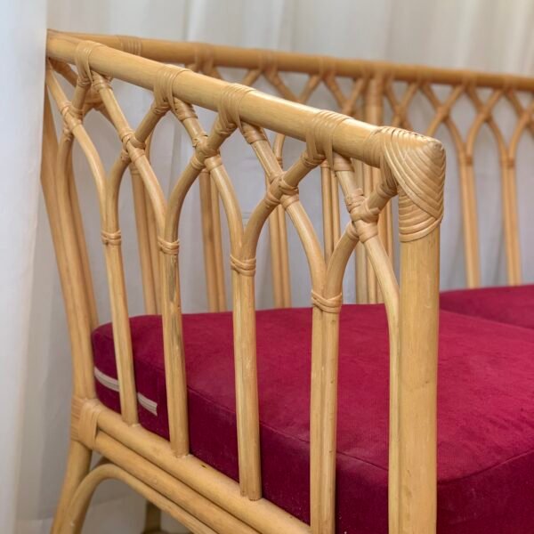Side profile of RIWAQ bamboo sofa showing double base rail