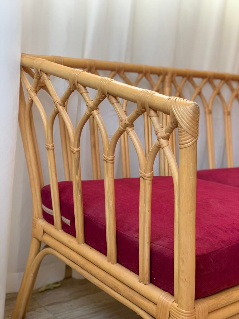 Side profile of RIWAQ bamboo sofa showing double base rail