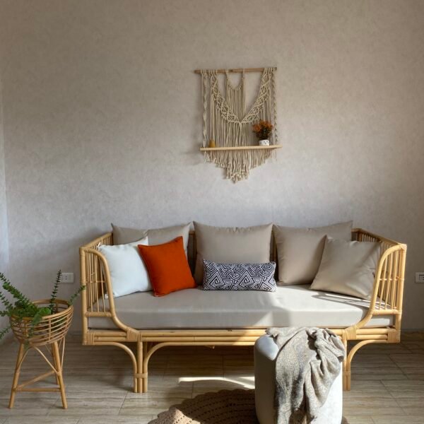 Spindle rail detail on the side of SEDRA rattan daybed